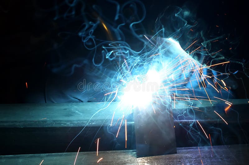 Electric Arc Welding. the Worker Welding Two Iron Corners Stock Image