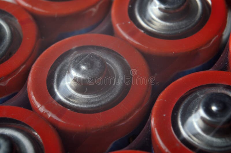 Electric Batteries and Accumulators of AAA AA Standard Size. Closeup