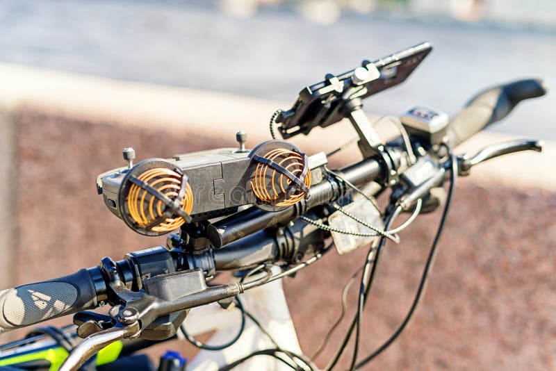 Electric Bike Handlebar with Many Modern Electronic Devices on it Stock