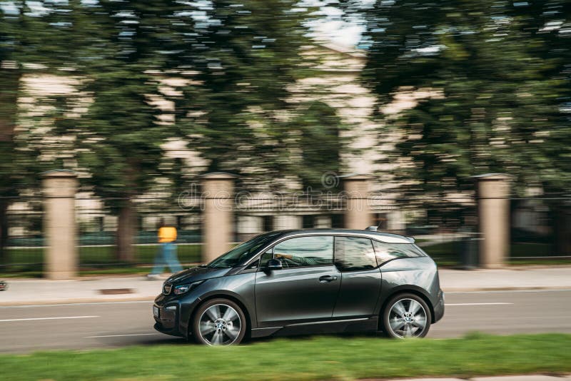 Oslo, Norway - June 24, 2019: Electric BMW i3 is a B-class, high-roof hatchback Fast Driving In City Street.