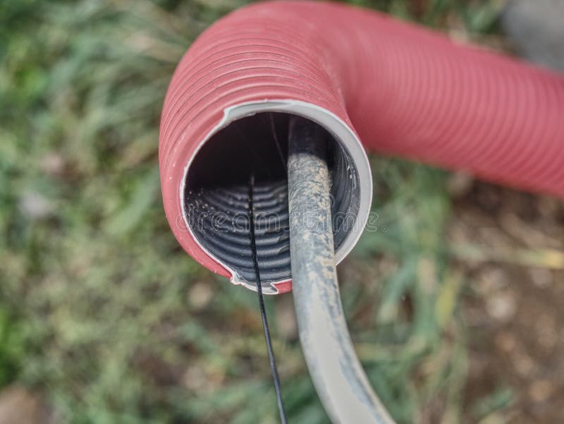 Electric Cable in the Flexible Safety Pipe in Pit Stock Image Image