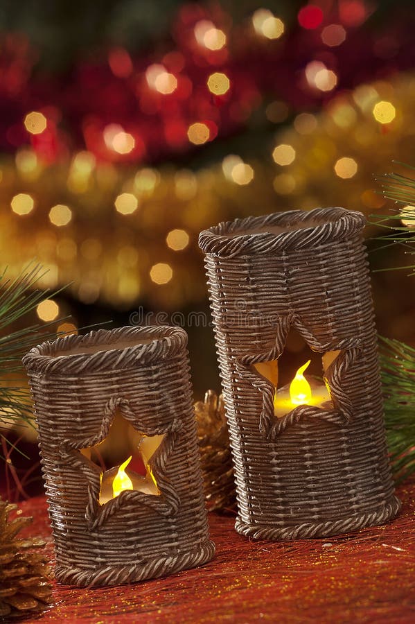 Electric Candles with Christmas Decorations in Atmospheric Light Stock