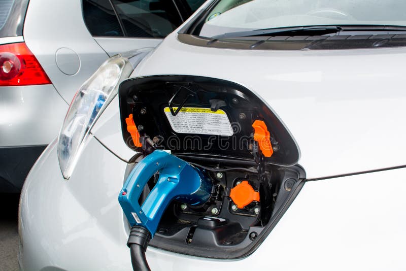 Electric car charging stock photo. Image of milan, charging 79653858