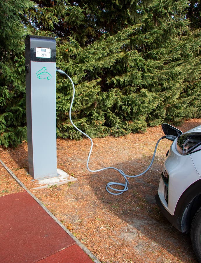 Electric Car with Charging Station in the Process of Charging Stock Image Image of fuel