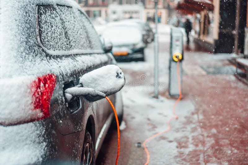 Electric Car Plug Charging in the Winter Stock Photo Image of modern