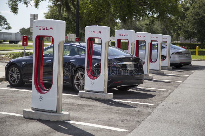 Electric cars at Tesla recharging stations