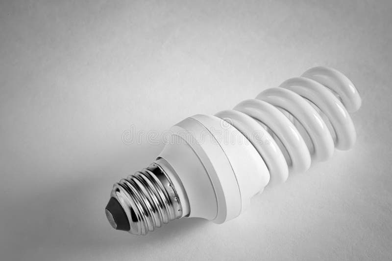 Electric Energysaving Lamp on a Light Background Stock Photo Image