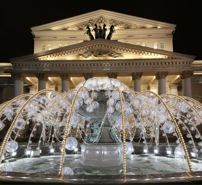 Electric fountain at night, lighted during christmas near the Bolshoi Theatre, Moscow