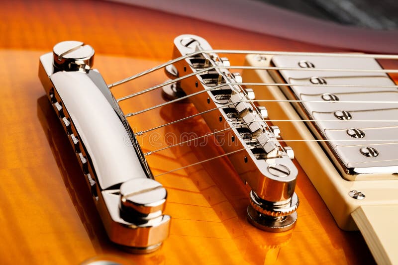Electric guitar bridge stock image. Image of brown, classic 275851517