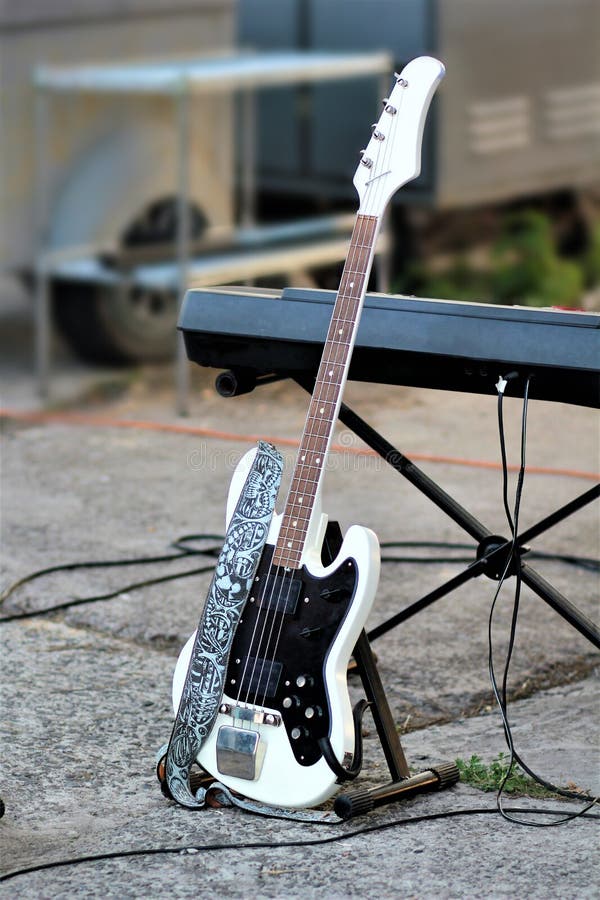 Electric Guitar Leaning at the Synthesizer Stock Image Image of music