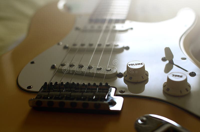 Zoom on a Electric guitar stock image. Image of hands 120013913
