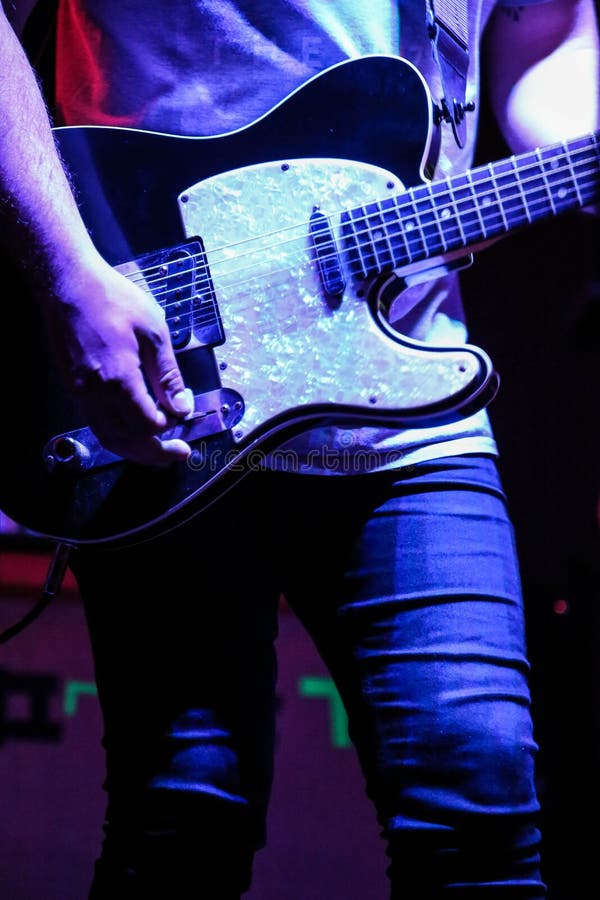 Electric guitar stock image. Image of playing, play 266693413