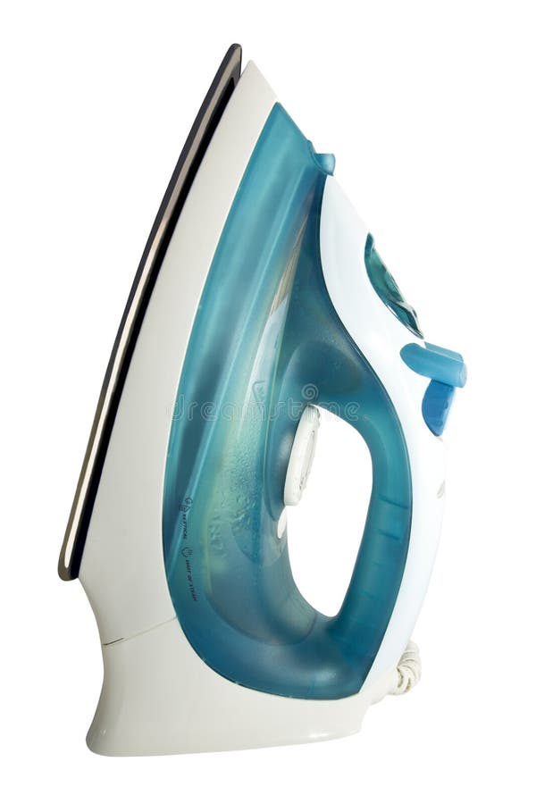 Electric Iron on the Ironing Board and a Pile of Colorful Clothes