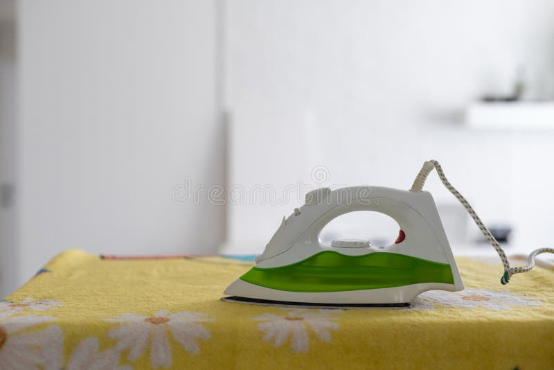 Electric Iron. . the Ironing Board Ignited. Stock Photo Image of
