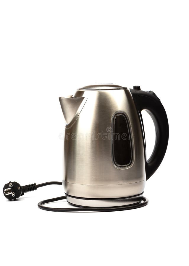 White electric kettle stands on a gray table plugged into a power outlet  Stock Photo - Alamy