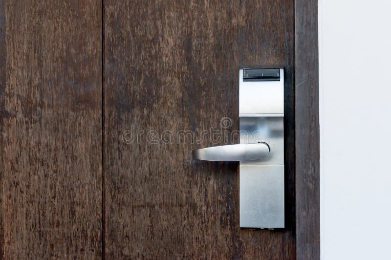 Electric lock on a wooden door stock photos Electric lock on a wooden door stock photos