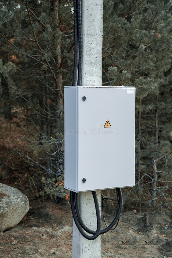 Electric Metal Box on a Pole. Electric Control on a Pole Stock
