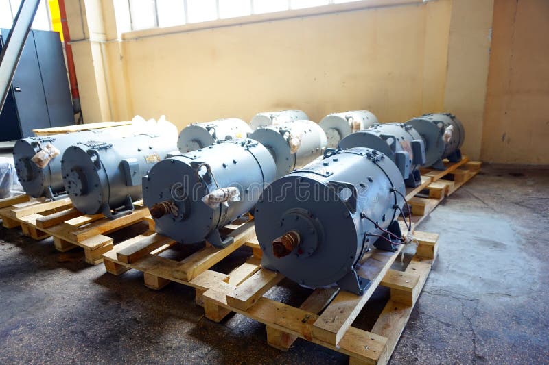 The Electric Motors are on a Rack in a Warehouse, in Production. Stock