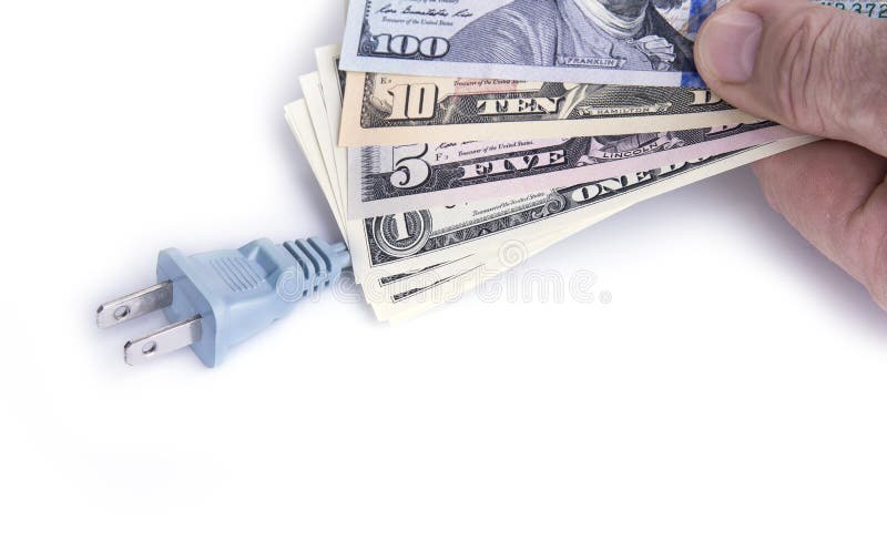 Electric plug with dollar money on the white. Energy save concept. stock photos Electric plug with dollar money on the white. Energy save concept. stock photos