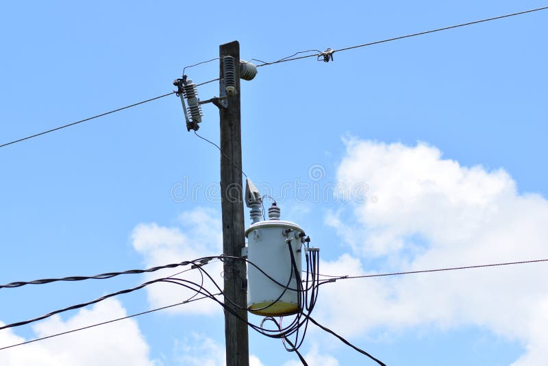 Electric pole wires and transformer stock images