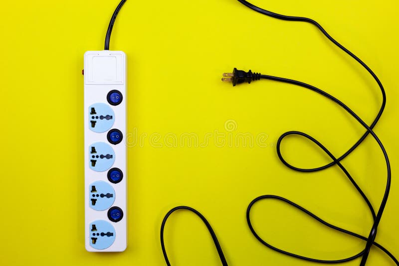 Electric power socket and plug on yellow paper background. stock photos Electric power socket and plug on yellow paper background. stock photos
