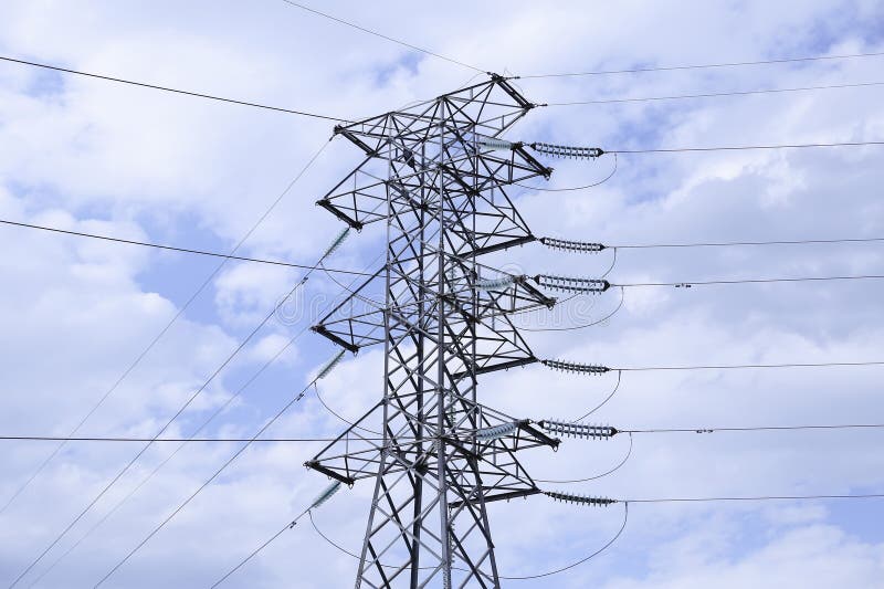 Electric Power Transmission Tower with Cables Connected Stock Photo