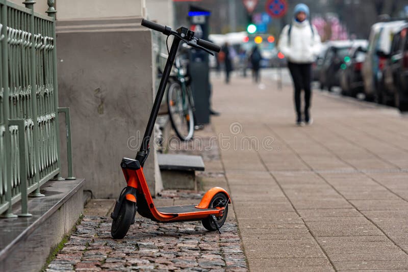 An Electric Scooter Parked on the Sidewalk in Riga, Latvia Stock Image Image of rental, city