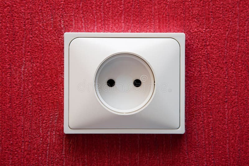 The Electric Socket in a Red Wall Stock Image Image of objects