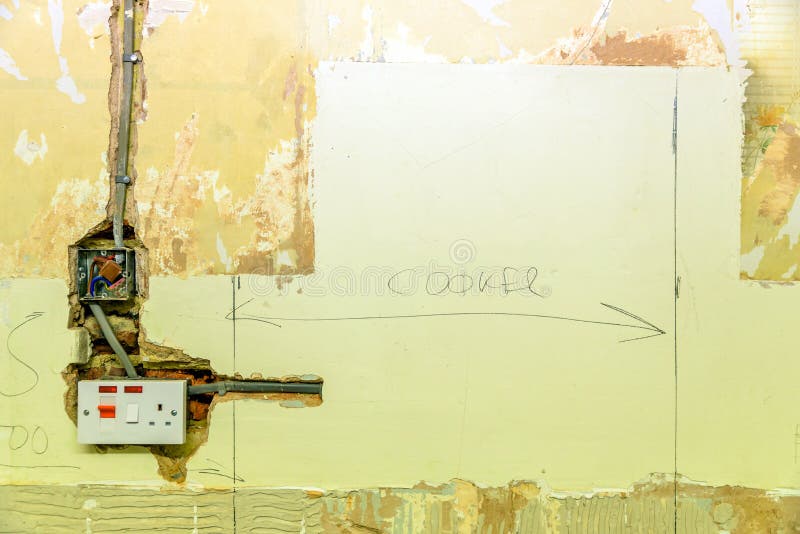 Electric Socket in a Wall during Renovation in England Uk Stock Image