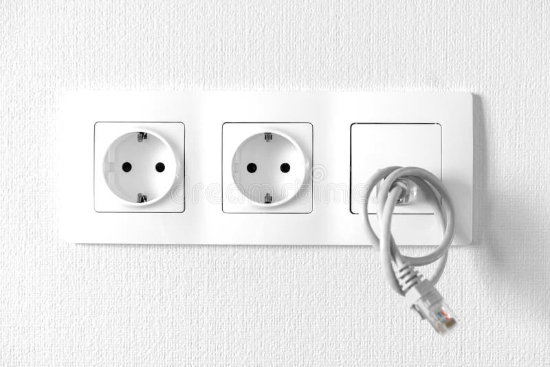 Electric Sockets and Outlet Built into a Single Unit. Stock
