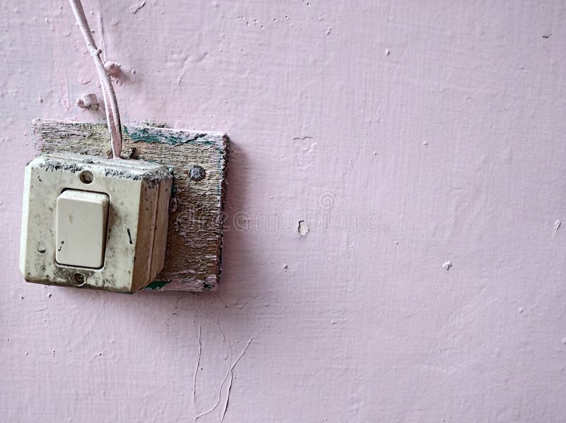 Electric Switch Affixed To the Wall Outside the House Stock Image