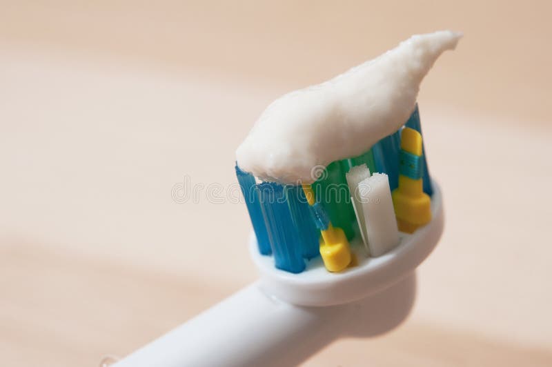 Orange Toothbrush and Toothpaste on White Stock Photo Image of paste