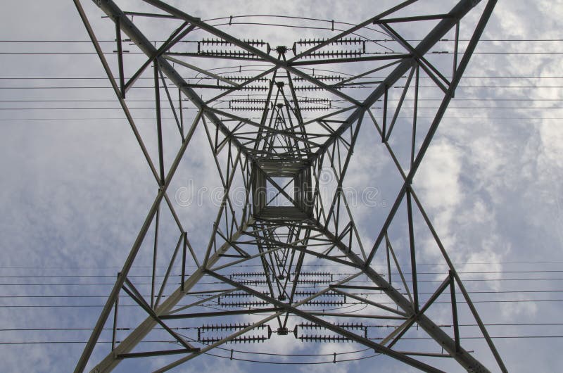 High voltage tower on a background of the cloudy sky. High voltage tower on a background of the cloudy sky