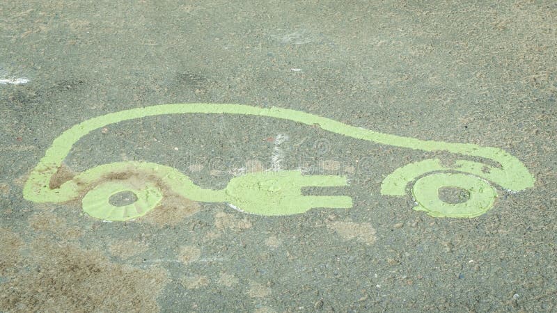 electric-vehicle-sign-painted-on-asphalt-road-indicating-a-charging