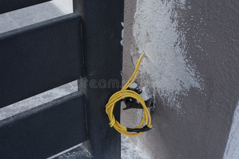 3 Electric Wires Laying Out from the Concrete Wall Stock Photo Image