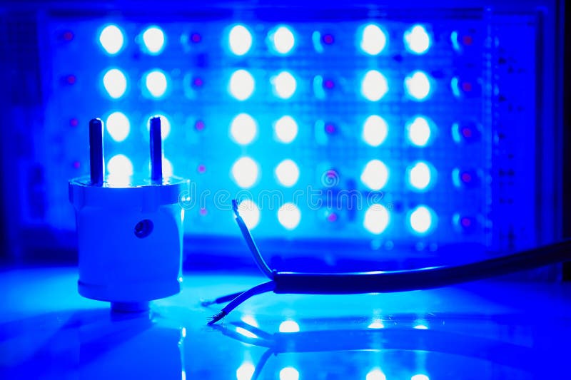 Electrical Blue Equipment Connection. Core Electric Cable and Lighting LED Lamp Stock Photo
