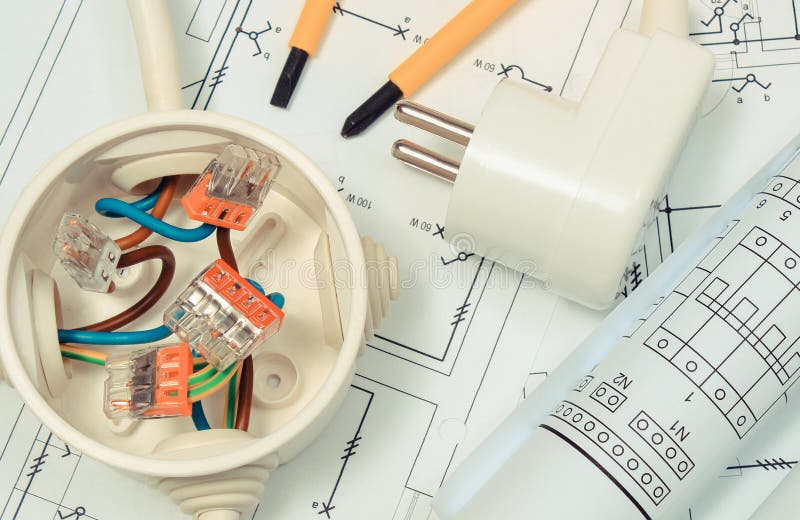 Electrical Box with Connections of Electric Copper Wires and Construction Drawing of House