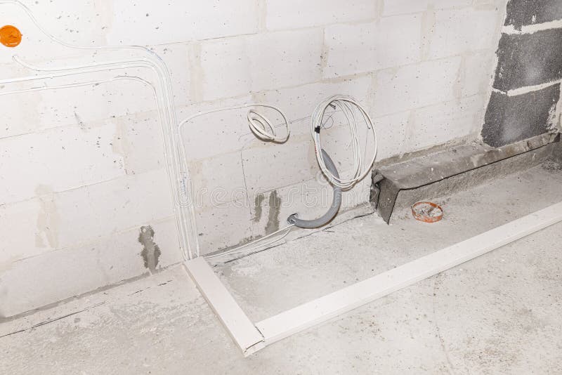 Electrical Cables on the Floor in Plastic Trays, and on the Walls