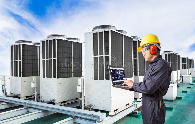 Electrical engineer using laptop computer for maintenance air stock images