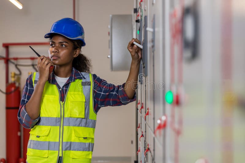 Electrical Engineer Working in Control Room. Electrical Engineer Man