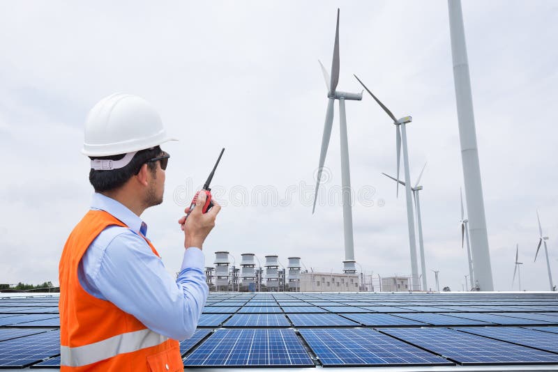 Electrical engineers working at wind turbine power generator stock photo
