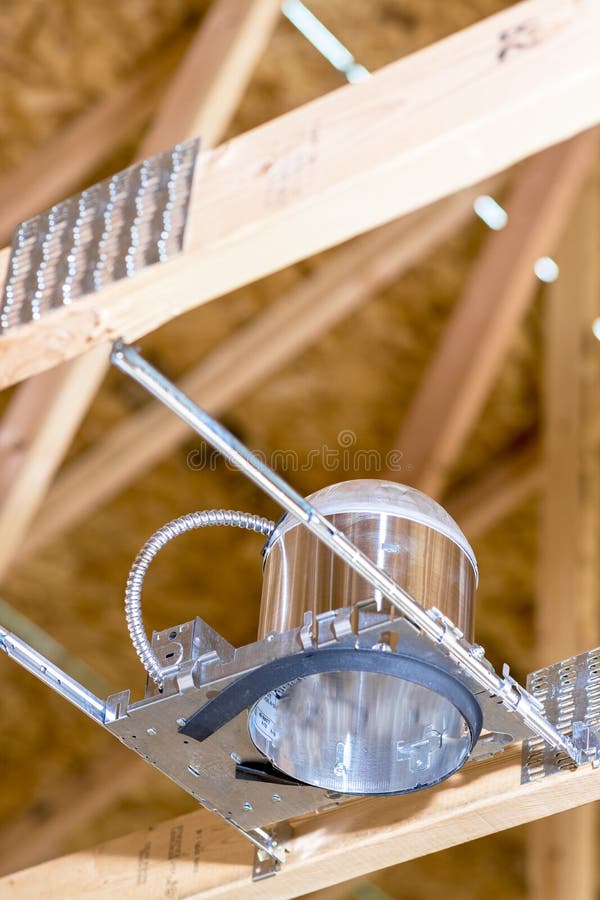 Electrical Exposed Connected Wires Protruding from Socket on White Wall