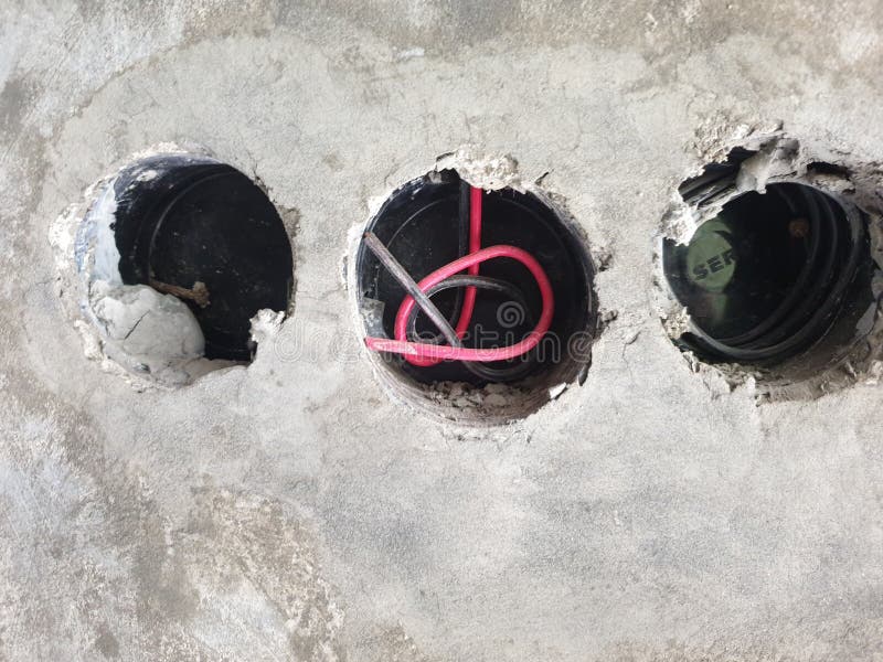 Electrical Installation Cables in the Walls of the House Stock Photo