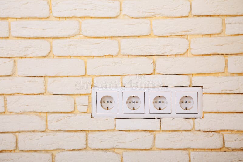 Power Outlets On The Brick Wall Stock Photo Image of nobody, energy