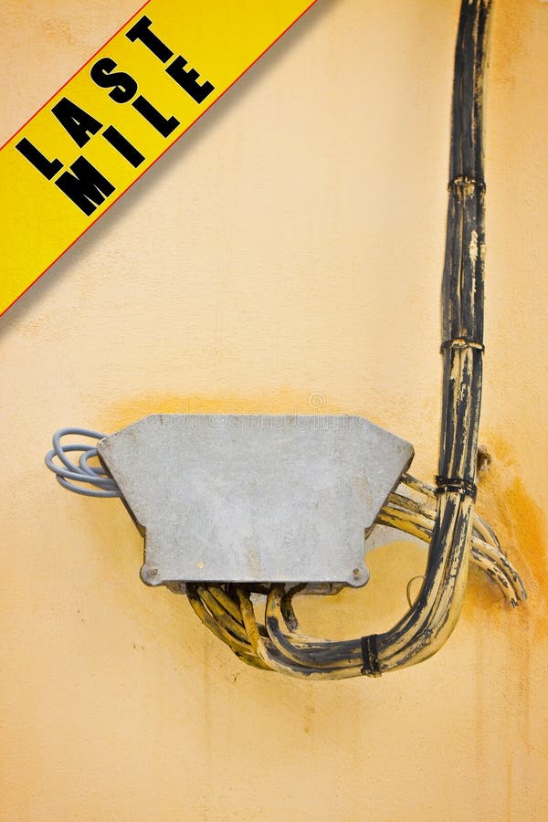 Electrical Power Cables Fixed on a Plaster Wall with Protection