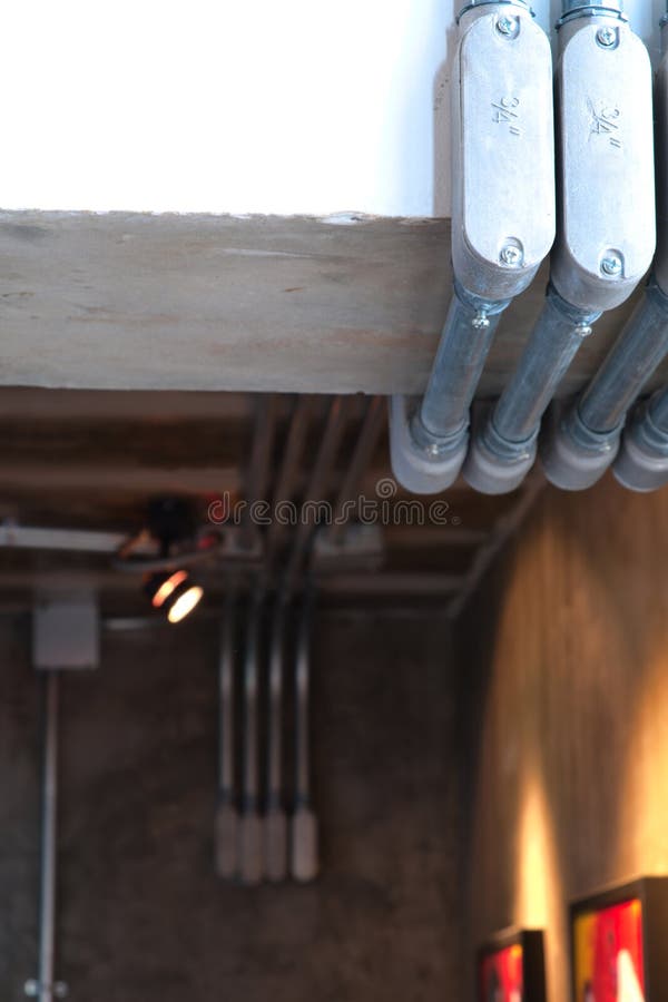 Loft Style Concrete Wall Conduit Pipe Stock Photo 781905913