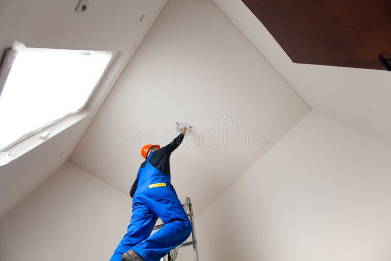 Electrician is Changing a Bulb royalty free stock photos Electrician is Changing a Bulb royalty free stock photos