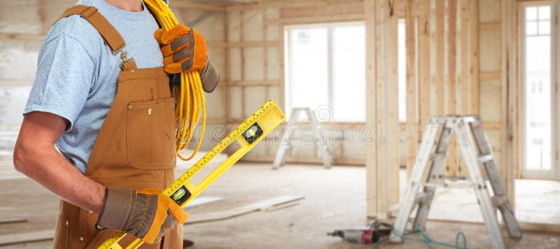 Professional construction worker electrician with electrical cable. Home electrician stock images, royalty-free photos and pictures