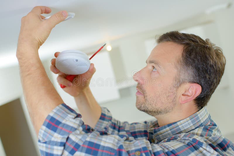 Download Electrician Fitting Fire Alarm Stock Photo - Image of electrician, electronic: 89315076