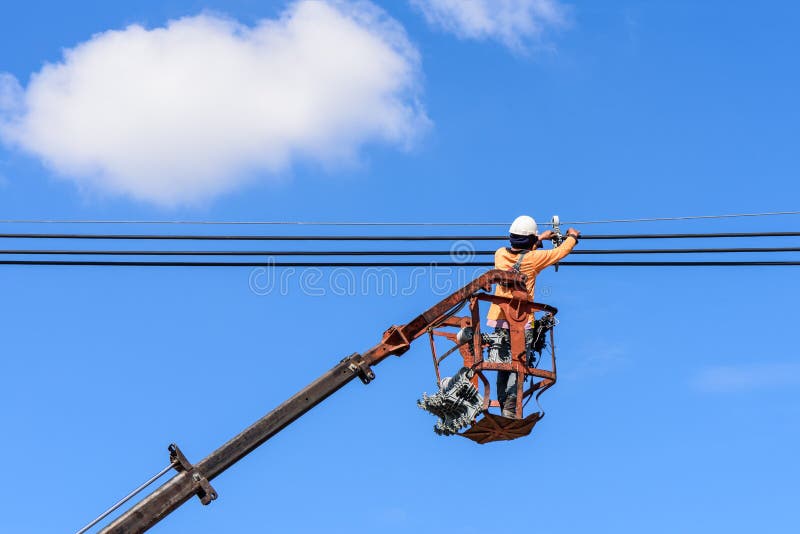 Electrician installing new power lines. royalty free stock photo
